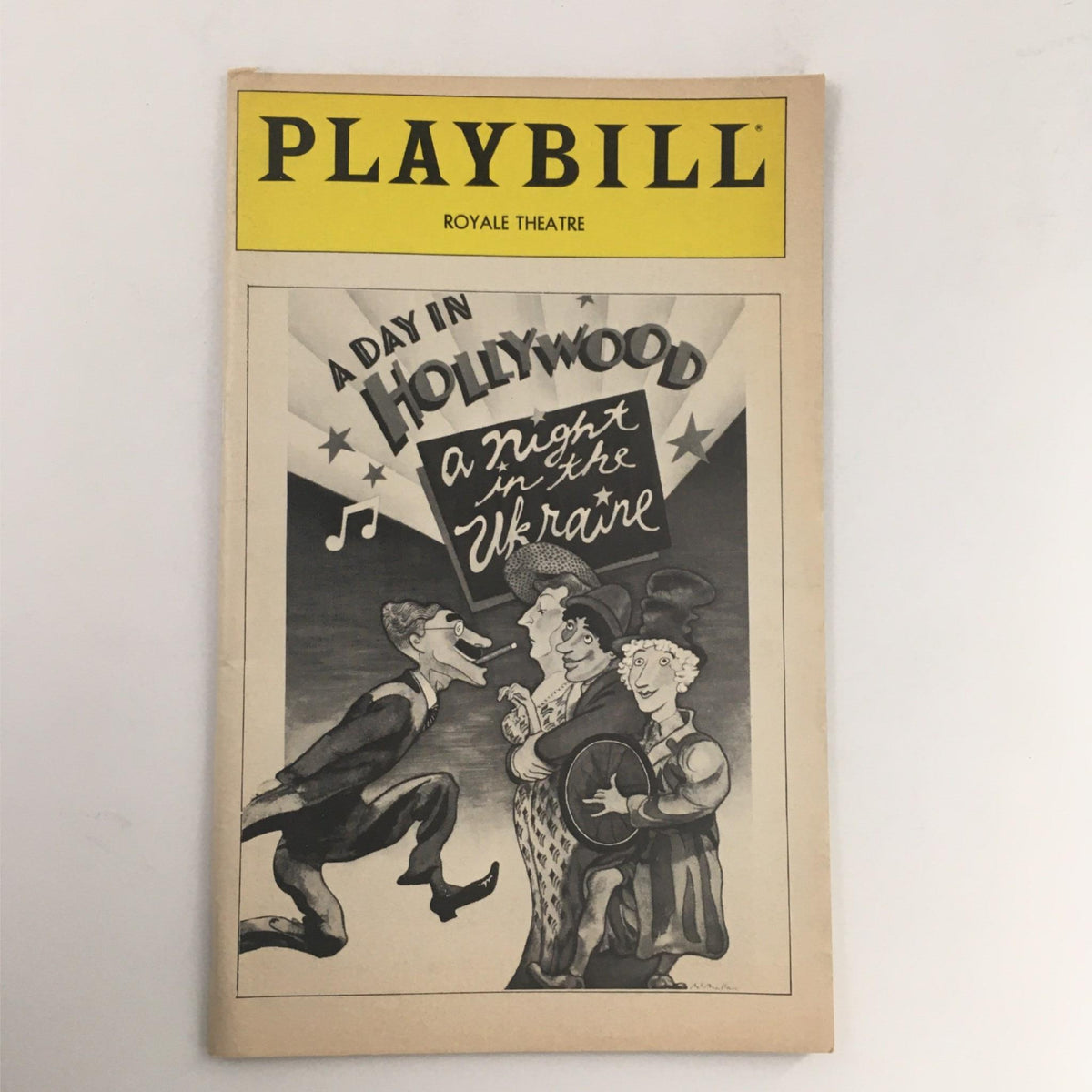 1981 Playbill for A Day in Hollywood A Night in the Ukraine, featuring a vintage cover illustration, showcasing characters in a theatrical performance.