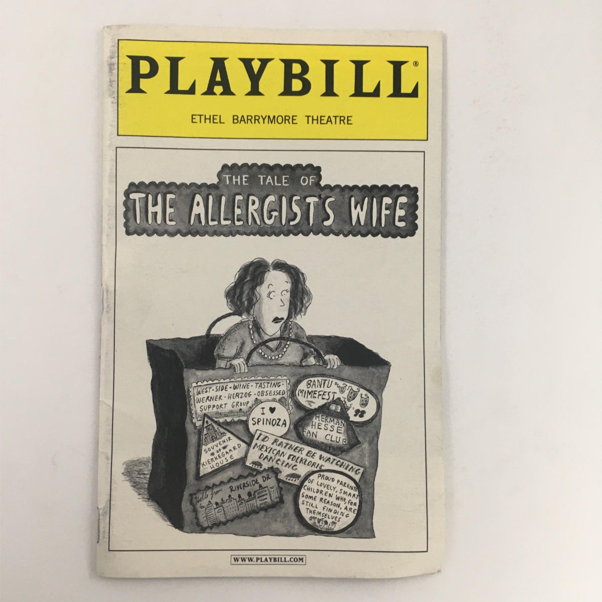 Playbill for 'The Tale Of The Allergists Wife' at Ethel Barrymore Theatre, featuring an illustration of a woman surrounded by theater-related clippings. This 2001 playbill is a great collectible for theater enthusiasts.