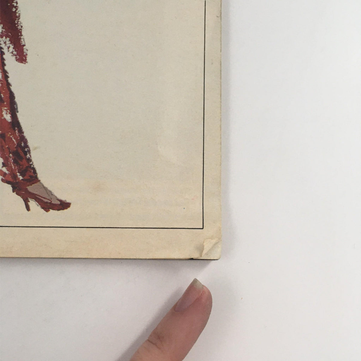 Close-up of the corner of the 1977 Playbill for 'The Act', highlighting minor wear and the distinctive design associated with this Broadway memorabilia.