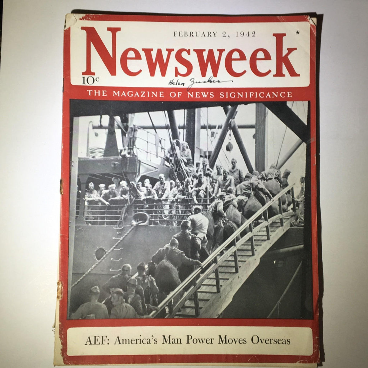 Cover of Newsweek Magazine from February 2, 1942, titled 'AEF: America's Man Power Moves Overseas', featuring a historical image of soldiers boarding a ship during World War II.