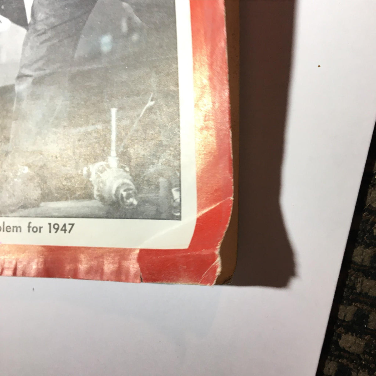 Detail shot of the bottom corner of Newsweek Magazine January 13, 1947, showing the condition of the magazine along with part of the headline 'America's Problem for 1947'.