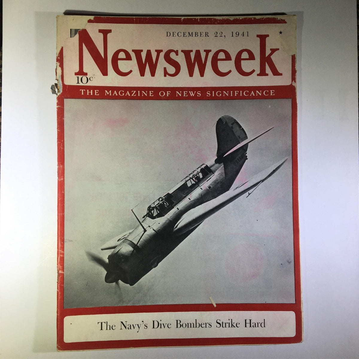 Cover of Newsweek Magazine dated December 22, 1941, featuring a Navy dive bomber with the headline 'The Navy's Dive Bombers Strike Hard'.