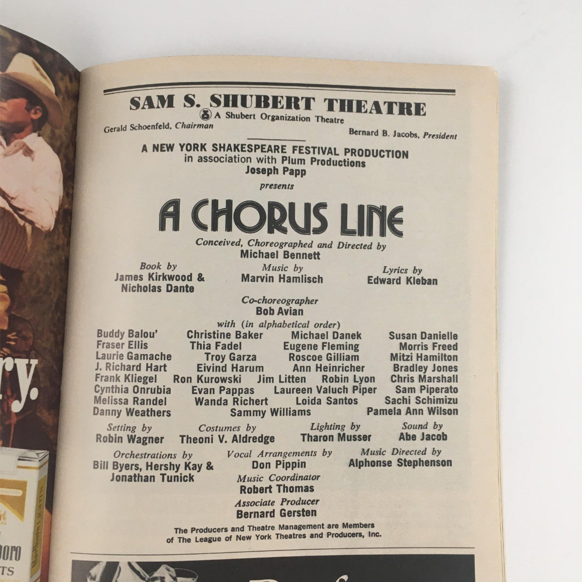 An inside page of the 1984 Playbill for A Chorus Line, detailing the production at Sam S. Shubert Theatre with credits including Michael Bennett and Marvin Hamlisch, showcasing cast and crew names and contributions.
