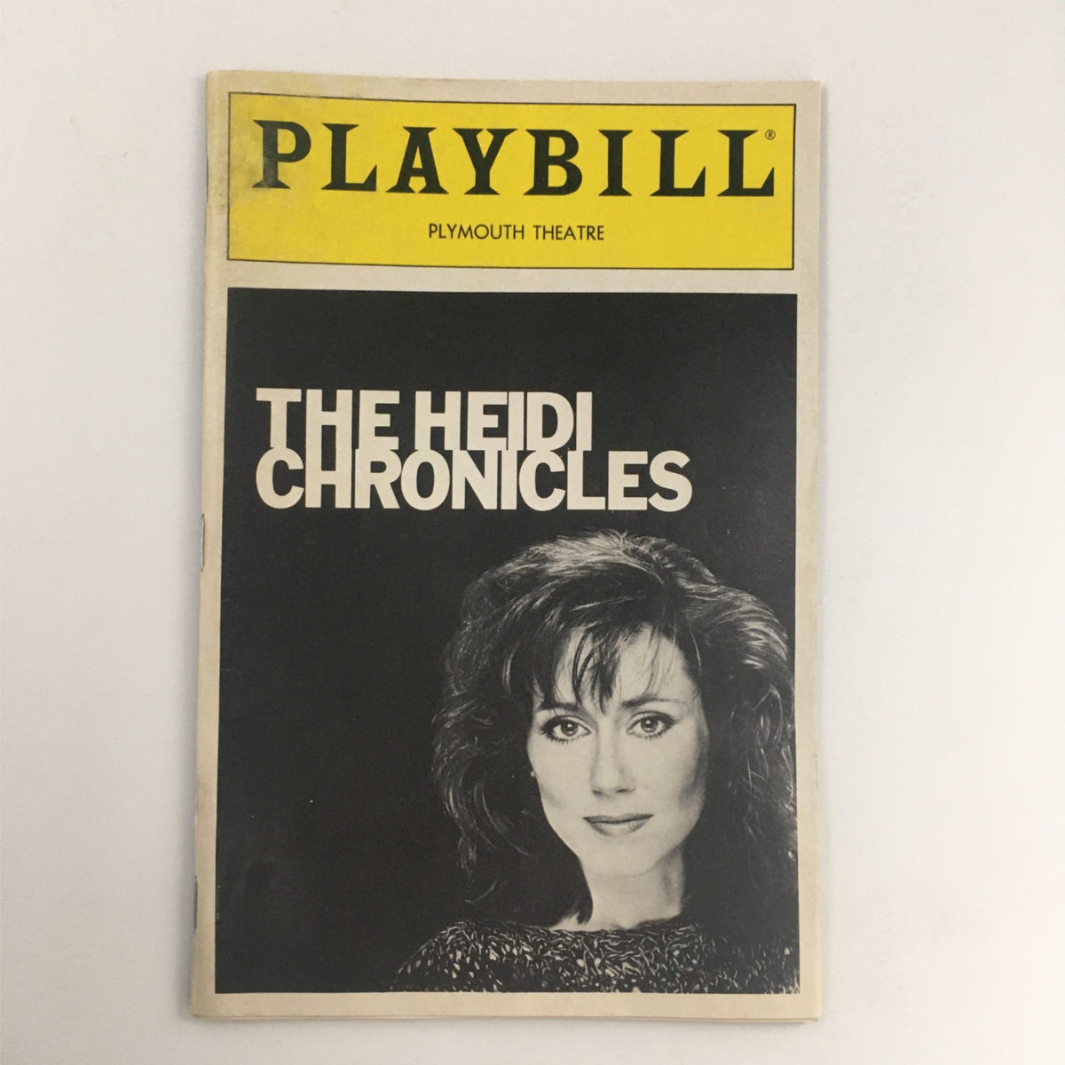 1990 Playbill for The Heidi Chronicles by Wendy Wasserstein at Plymouth Theatre featuring a striking black and white cover with actress Judith Ivey.