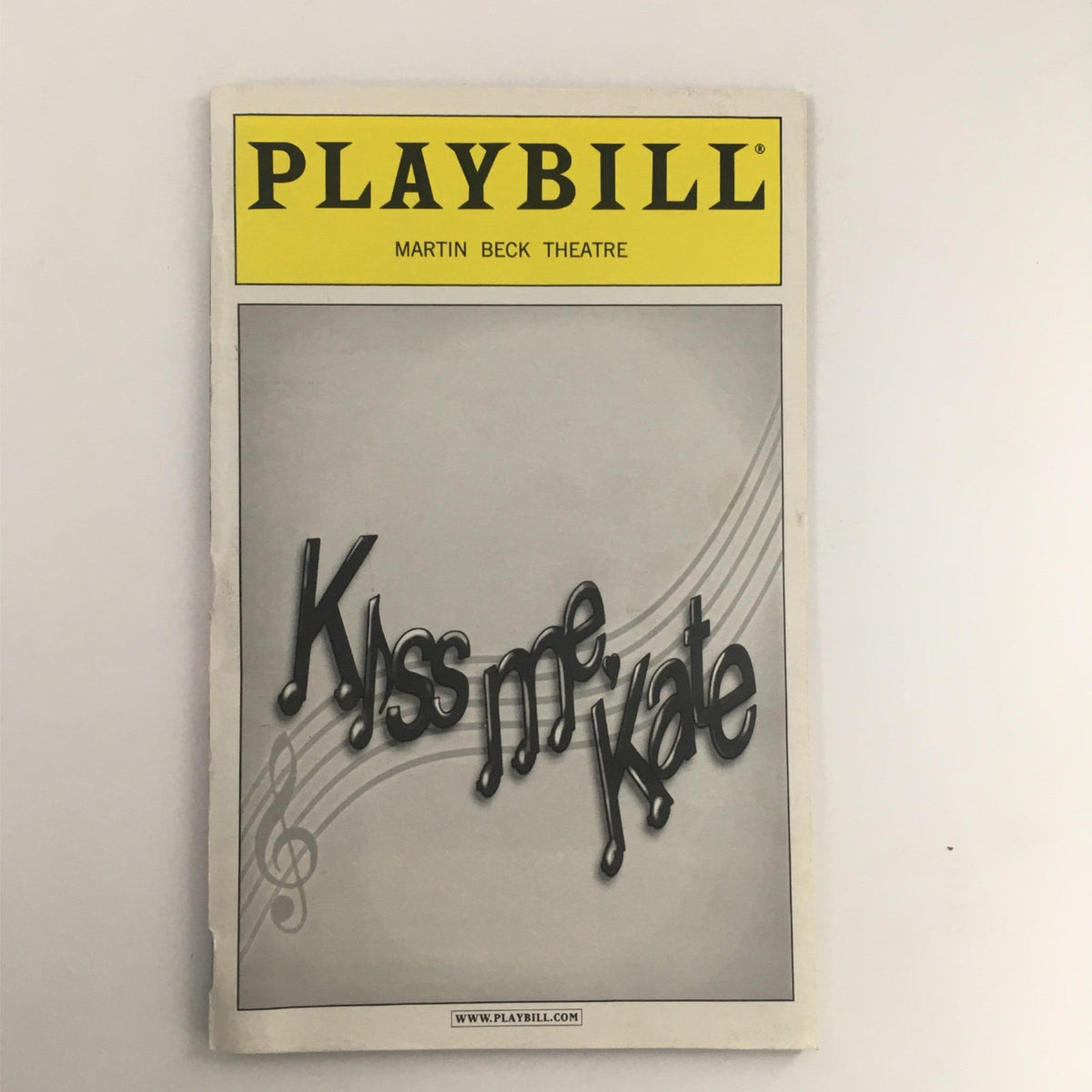 2000 Playbill for 'Kiss Me, Kate' at Martin Beck Theatre, featuring the title in elegant lettering and orchestral music notes.
