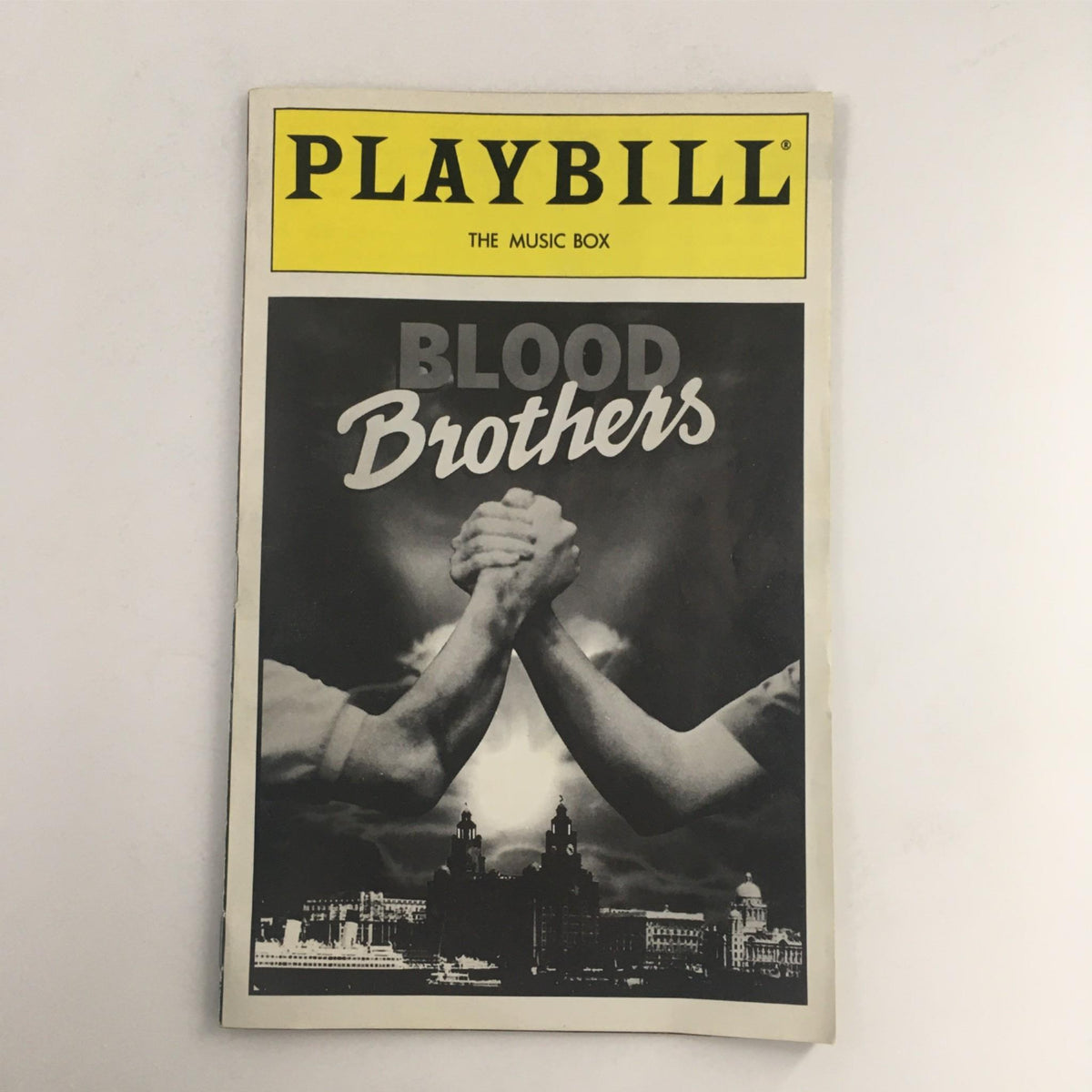 1993 Playbill for Blood Brothers by Willy Russell, featuring cover art with the title 'Blood Brothers' and an image symbolizing brotherhood at The Music Box Theatre, in Very Good condition.