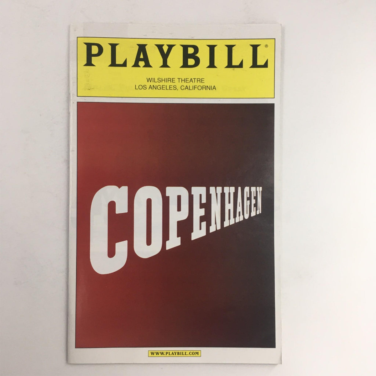 2001 Playbill for Copenhagen at Wilshire Theatre featuring a striking visual design with the title 'COPENHAGEN' prominently displayed. Ths Playbill highlights a notable theatrical production by Michael Frayn.