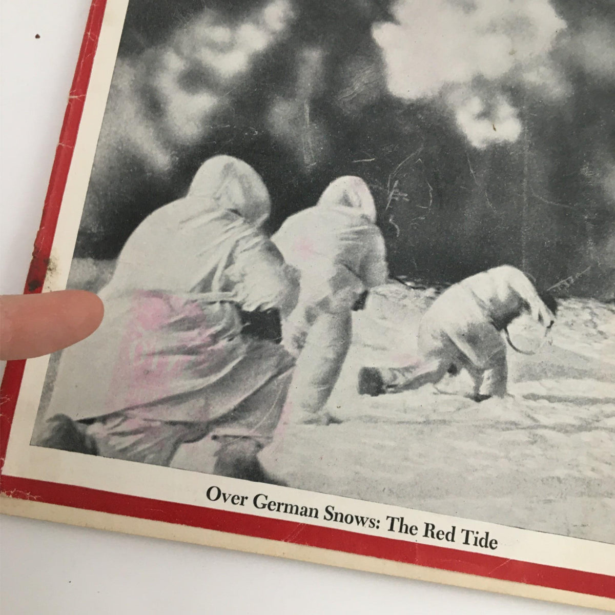 Close-up view of the Newsweek Magazine cover from January 29, 1945, titled 'Over German Snows: The Red Tide' showcasing soldiers in winter gear.