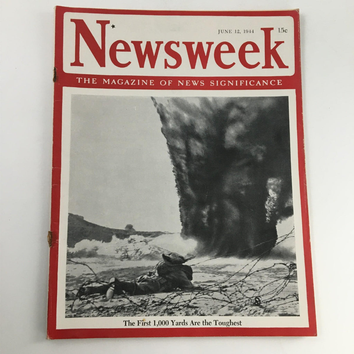 Cover of Newsweek Magazine June 12, 1944 featuring the headline 'The First 1,000 Yards Are The Toughest' with a historical image from World War II.