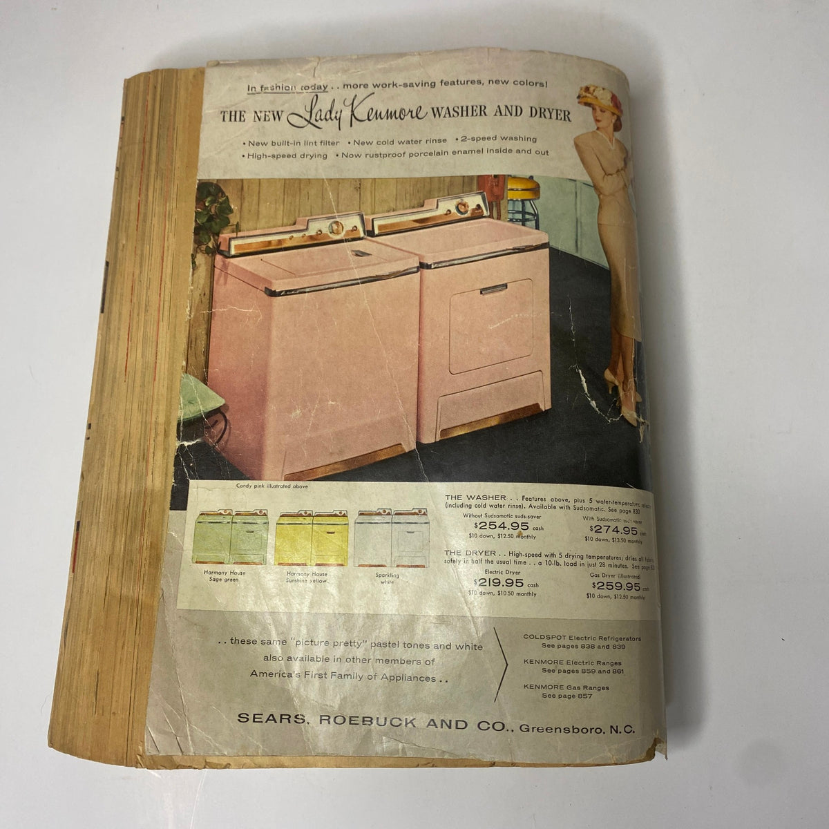Advertising for the Lady Kenmore Washer and Dryer from the 1957 Sears Spring and Summer Catalog highlights its features, pricing, and pastel color options.