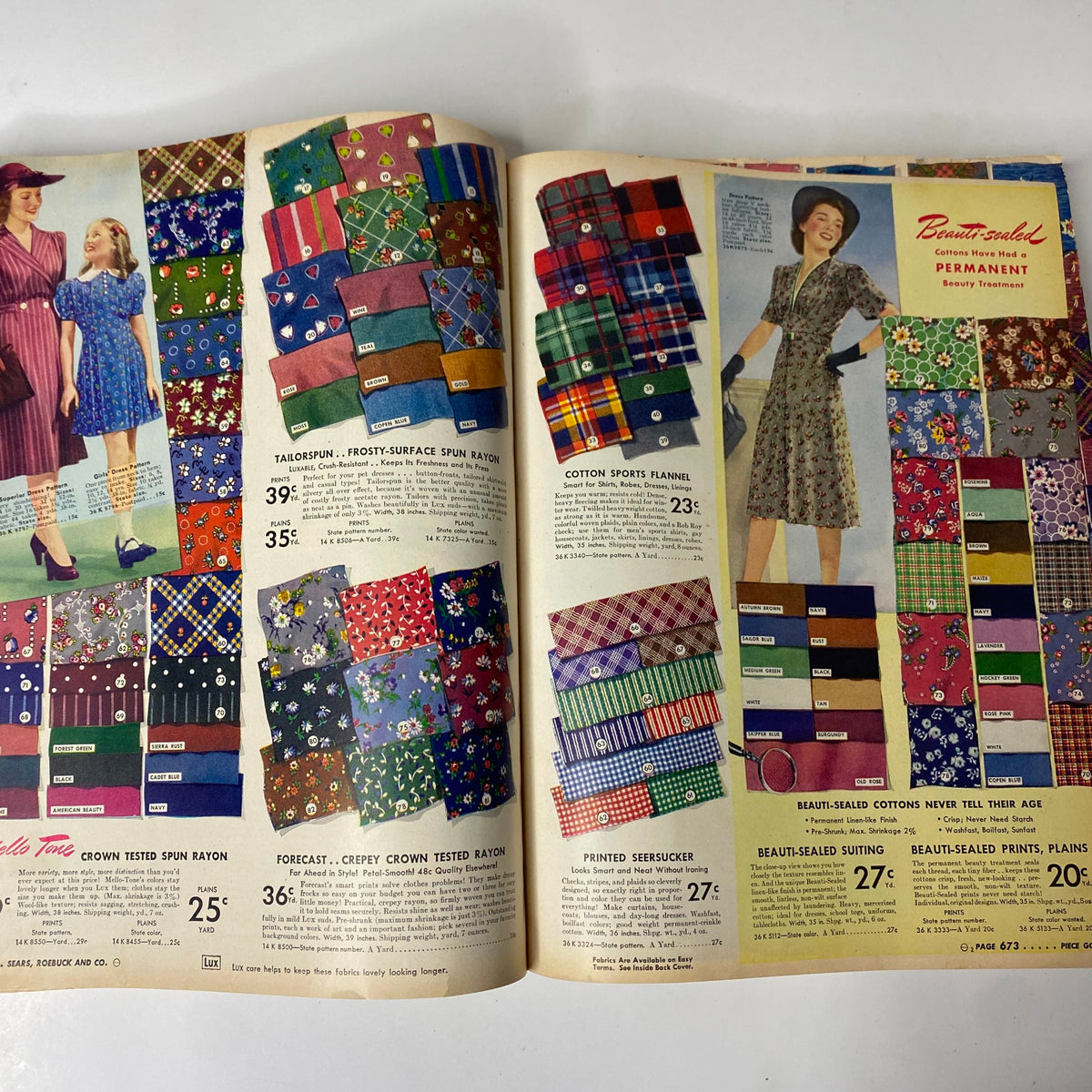 1941 - 1942 Sears Fall and Winter Catalog with colorful textile patterns and fabrics, showcasing fabric options available during the early World War II era.