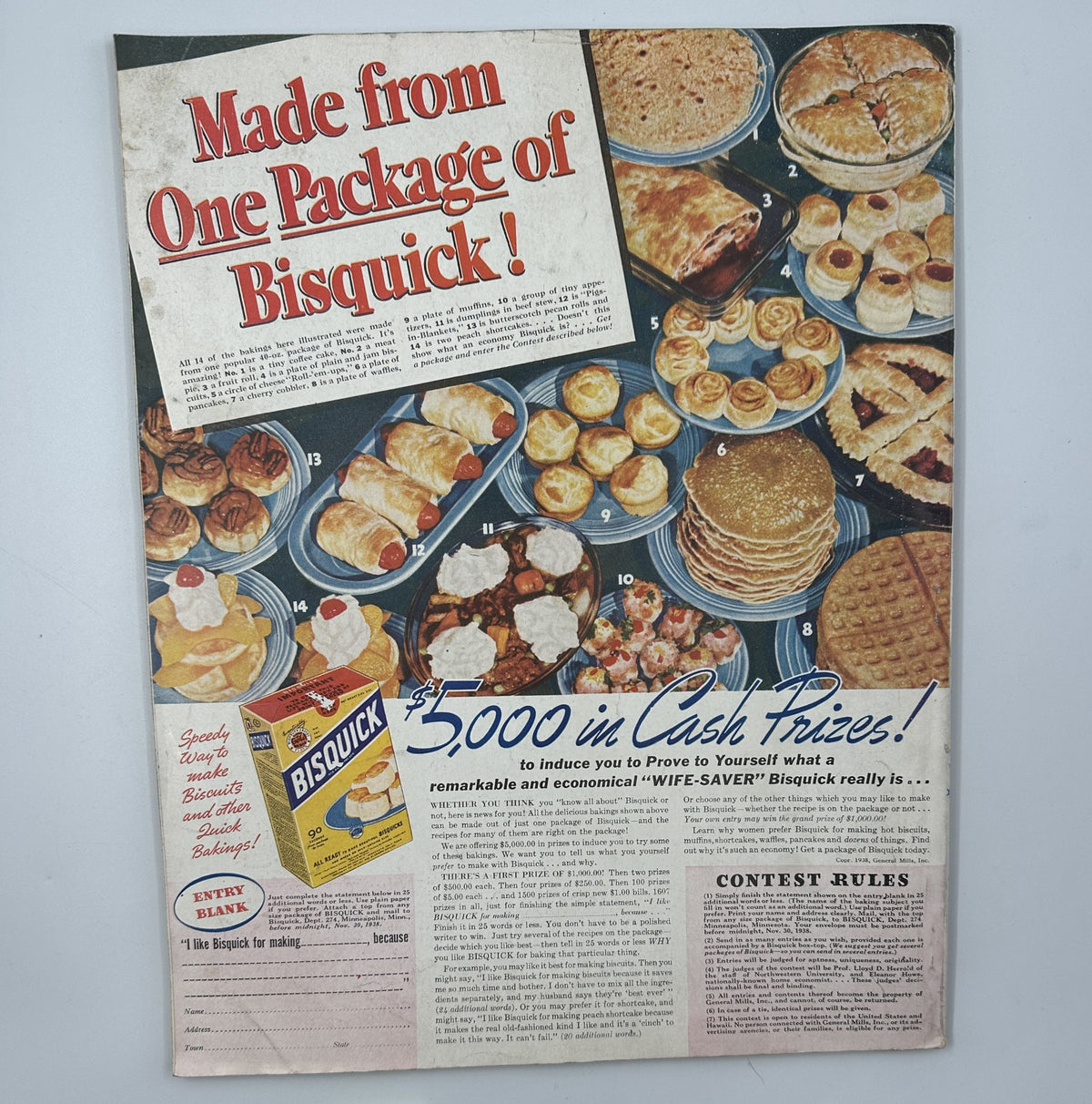 Back cover of Woman’s Home Companion Magazine, November 1938, promoting Bisquick with an advertisement for a cash prize contest and showcasing various baked goods.