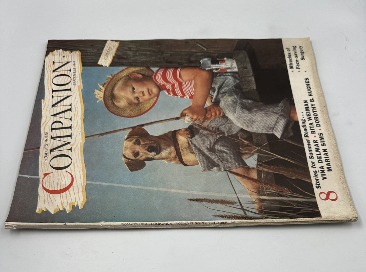 Front cover of Woman’s Home Companion Magazine September 1944 highlighting a child and a dog, with mention of summer reading stories and face-saving surgery.