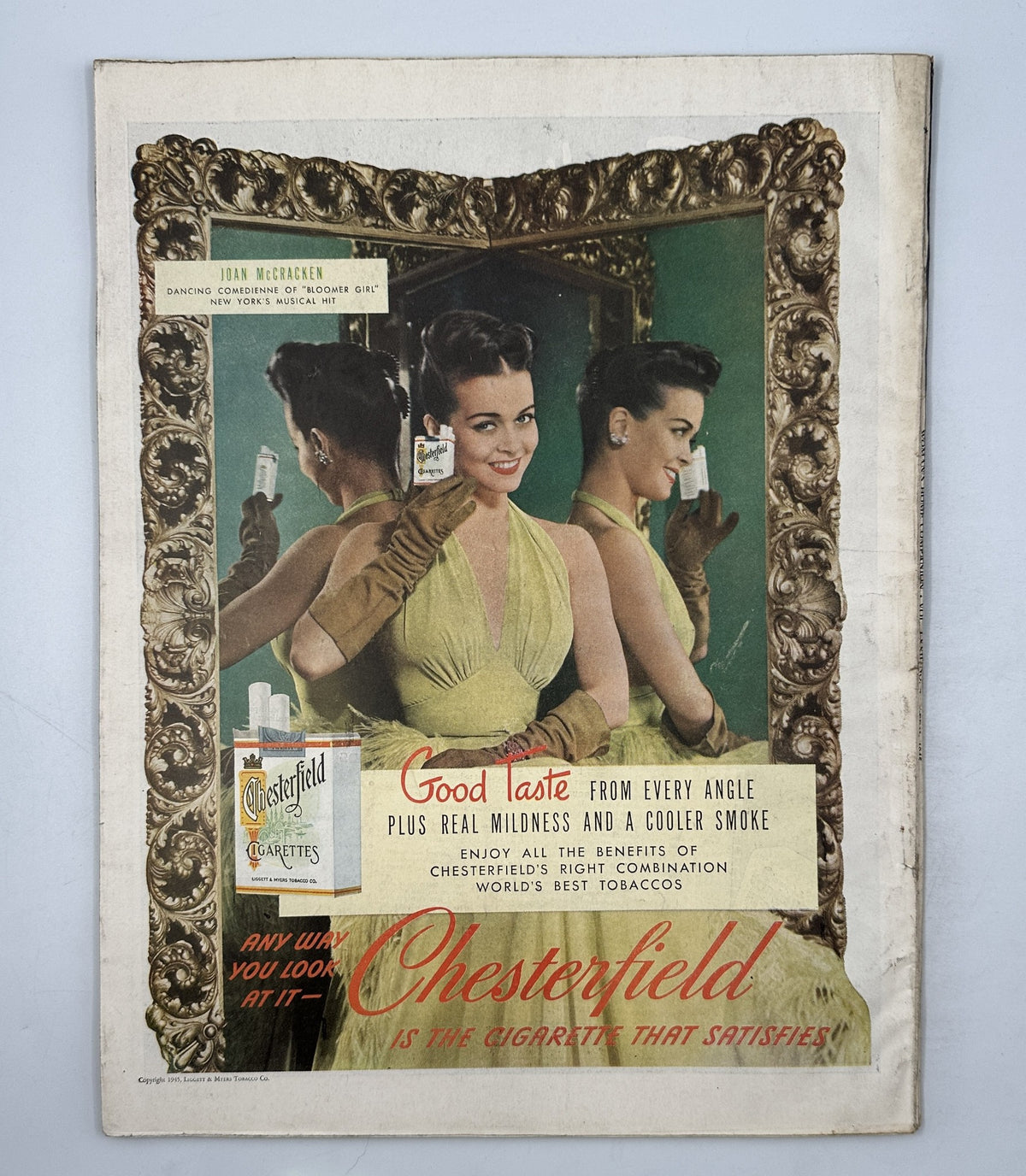 Back cover of Woman’s Home Companion Magazine April 1945 featuring an advertisement for Chesterfield cigarettes with a stylish woman.