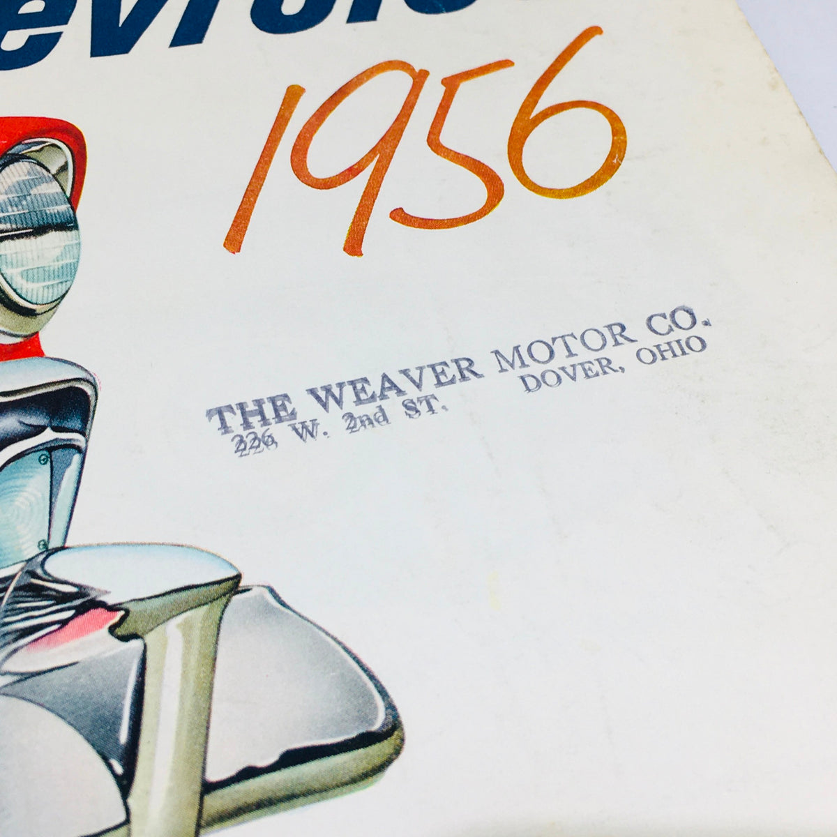Vintage 1956 Chevrolet brochure cover featuring an illustration of a car and the text '1956' from The Weaver Motor Co., showcasing American automotive history.