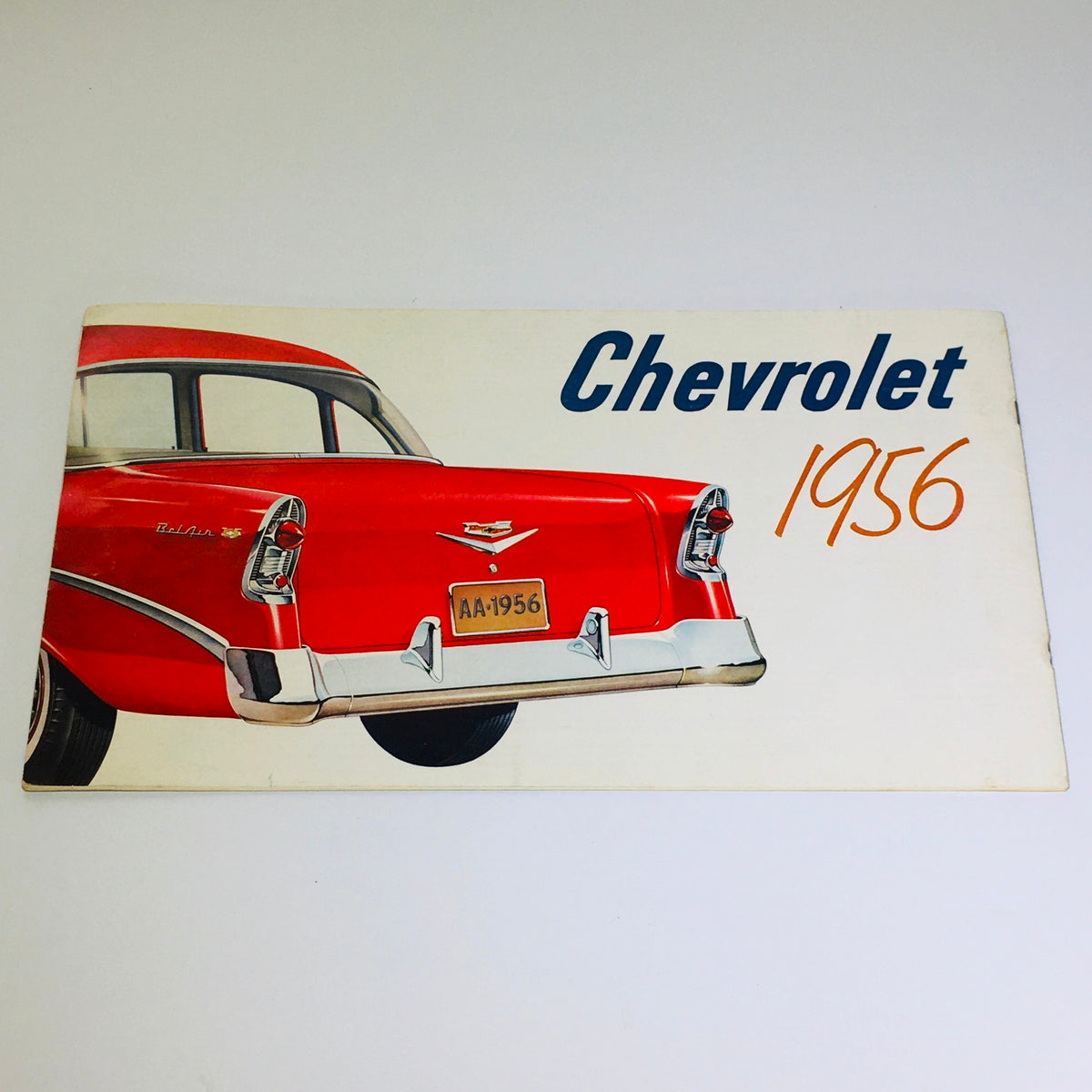 Back cover of the vintage 1956 Chevrolet brochure featuring a rear view illustration of a red Chevrolet car with the text 'Chevrolet 1956' prominently displayed.
