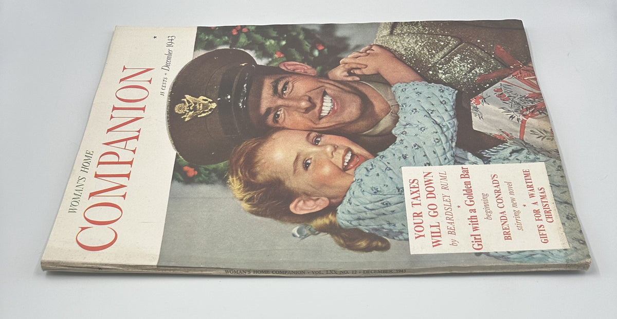 Another angle of the Woman’s Home Companion Magazine December 1943, highlighting the Christmas girl and soldier cover art, with a nostalgic holiday vibe.