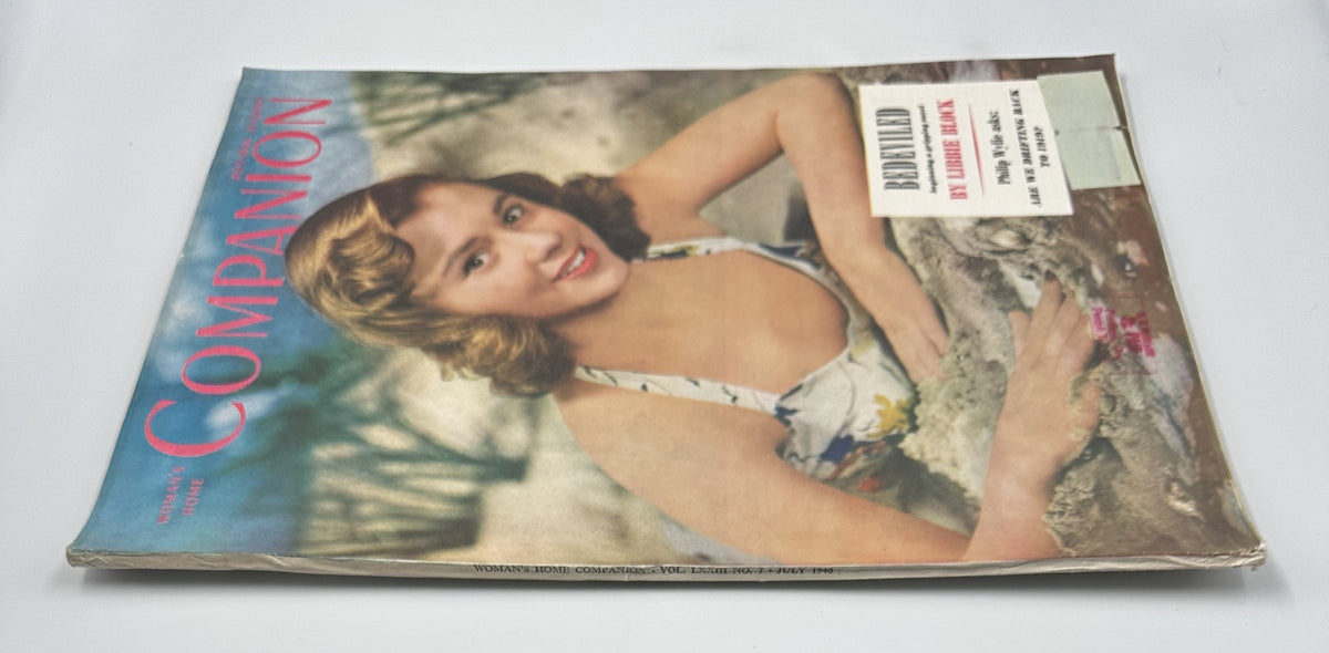 Side view of the Woman's Home Companion Magazine July 1946, prominently displaying the title and the article 'Bedeviled' by Libbie Block with a woman in a floral bathing suit.