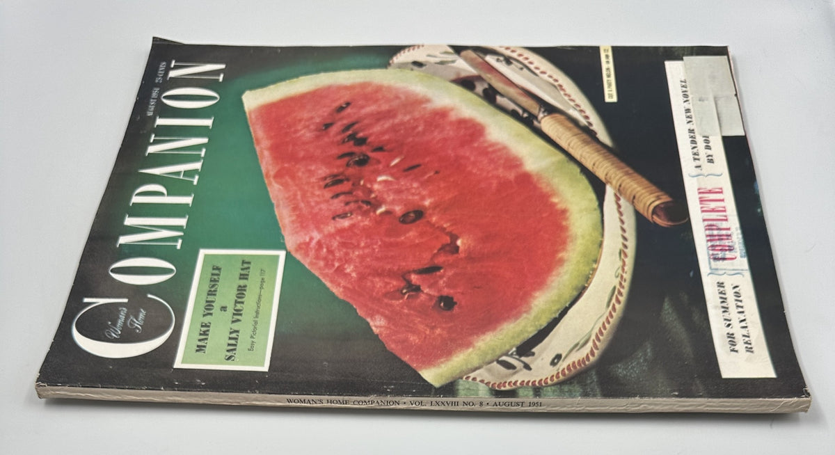 Side view of Woman’s Home Companion Magazine August 1951 displaying a colorful watermelon cover, showcasing the magazine title and projects like the Sally Victor Hat.