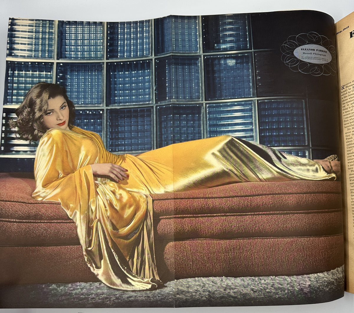 Portrait of actress Eleanor Parker in a striking golden gown from Esquire Magazine May 1942.