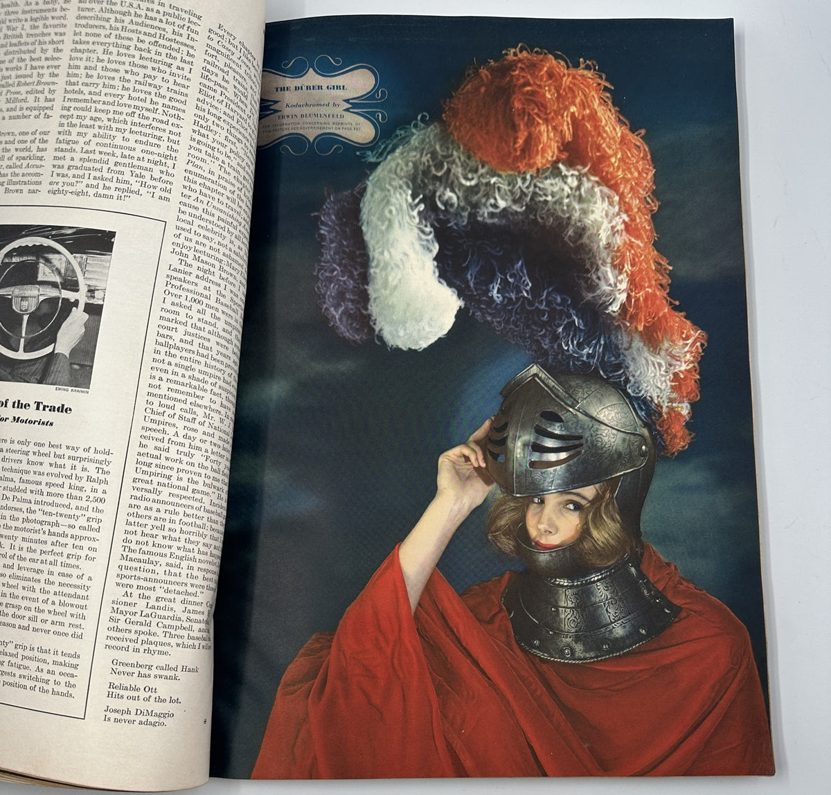 Artistic portrayal of a woman in medieval armor with colorful headgear from Esquire Magazine May 1942.