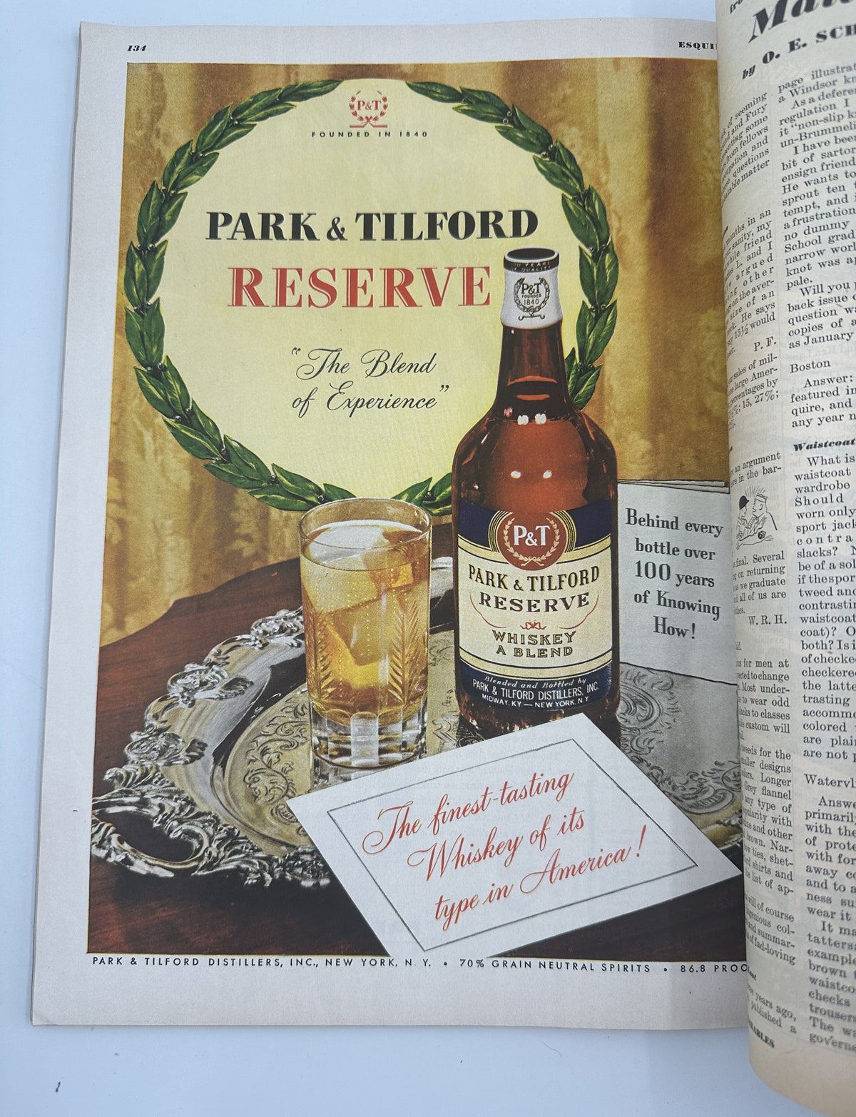 Advertisement for Park & Tilford Reserve whiskey featured in Esquire Magazine November 1945, showcasing a bottle and a glass of the drink.