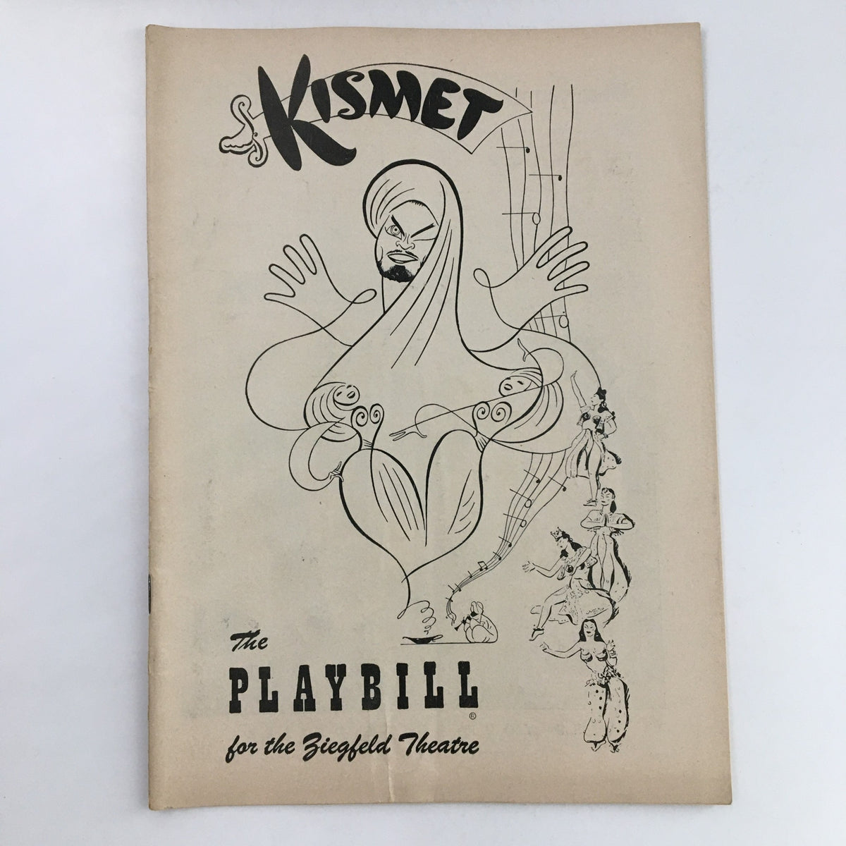 1953 Playbill for Kismet at The Ziegfeld Theatre featuring decorative illustrations, capturing the essence of the musical performances of Alfred Drake.