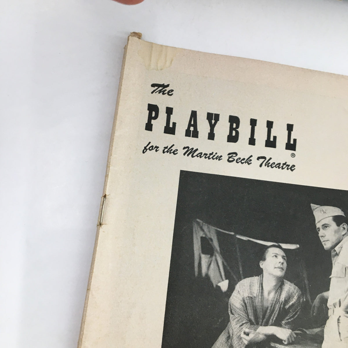 Front cover of the 1954 Playbill for The Teahouse of The August Moon at the Martin Beck Theatre, featuring a vintage design and images related to the production.