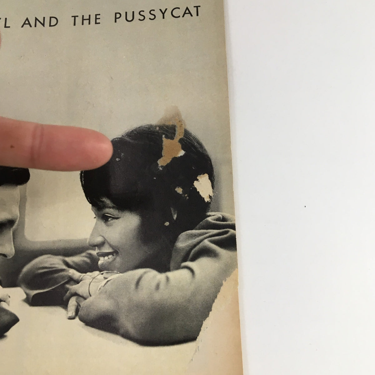 Close-up of the 1964 Playbill Anta Theatre for The Owl and The Pussycat, highlighting wear and tear on the cover.