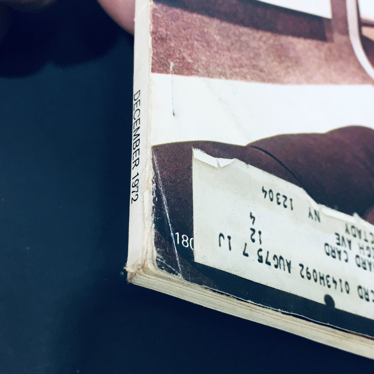 Side view of VTG Stereo Review Magazine December 1972 - Preview Of The Year 1973 showcasing the publication date and minor wear on the spine.