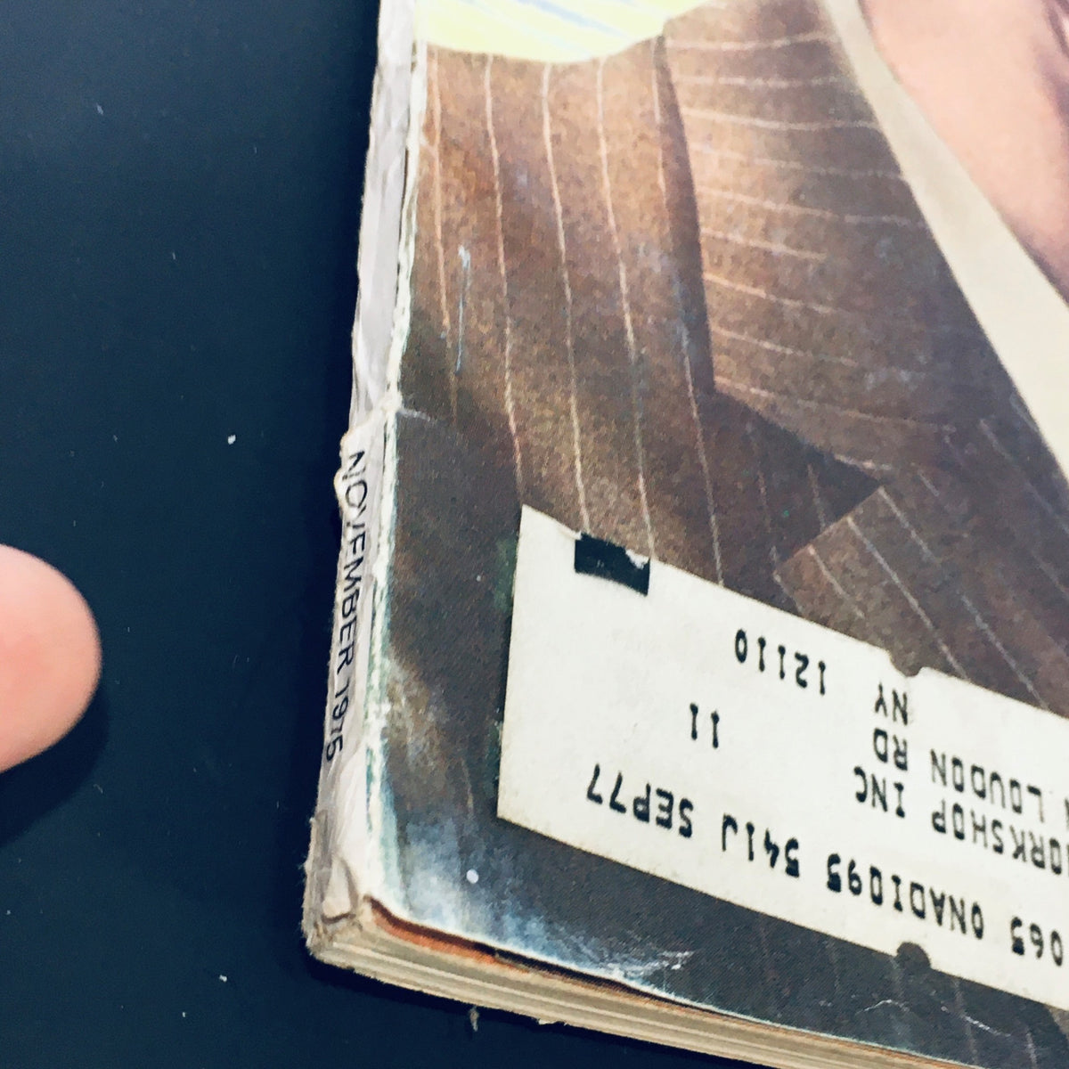Close-up of the spine of the VTG Stereo Review Magazine from November 1975, indicating the date and minor wear on the binding.