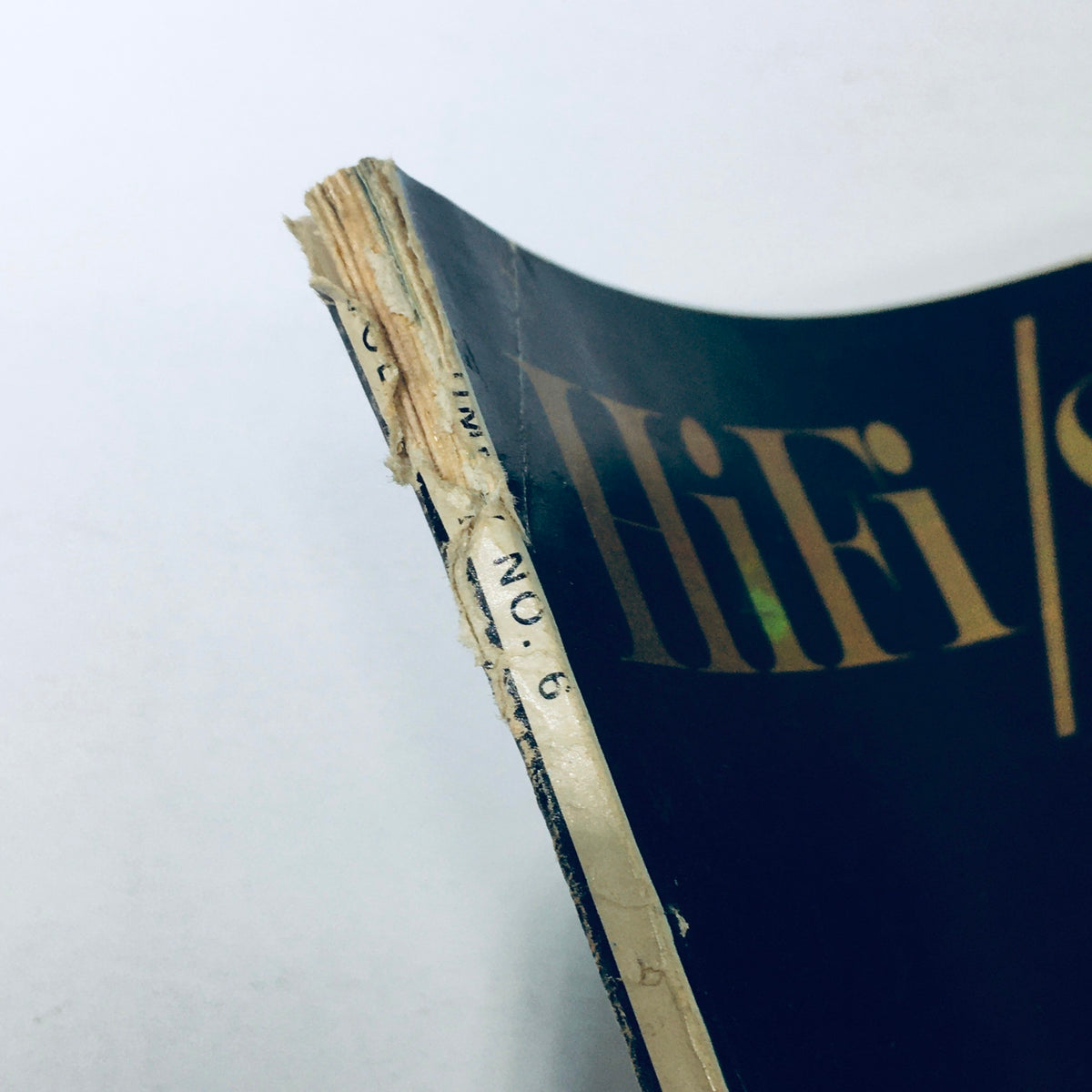 Close-up view of the edge of the VTG HiFi Stereo Review Magazine from December 1961, displaying its vintage wear and detailing, emphasizing the title 'HiFi' alongside the issue number.