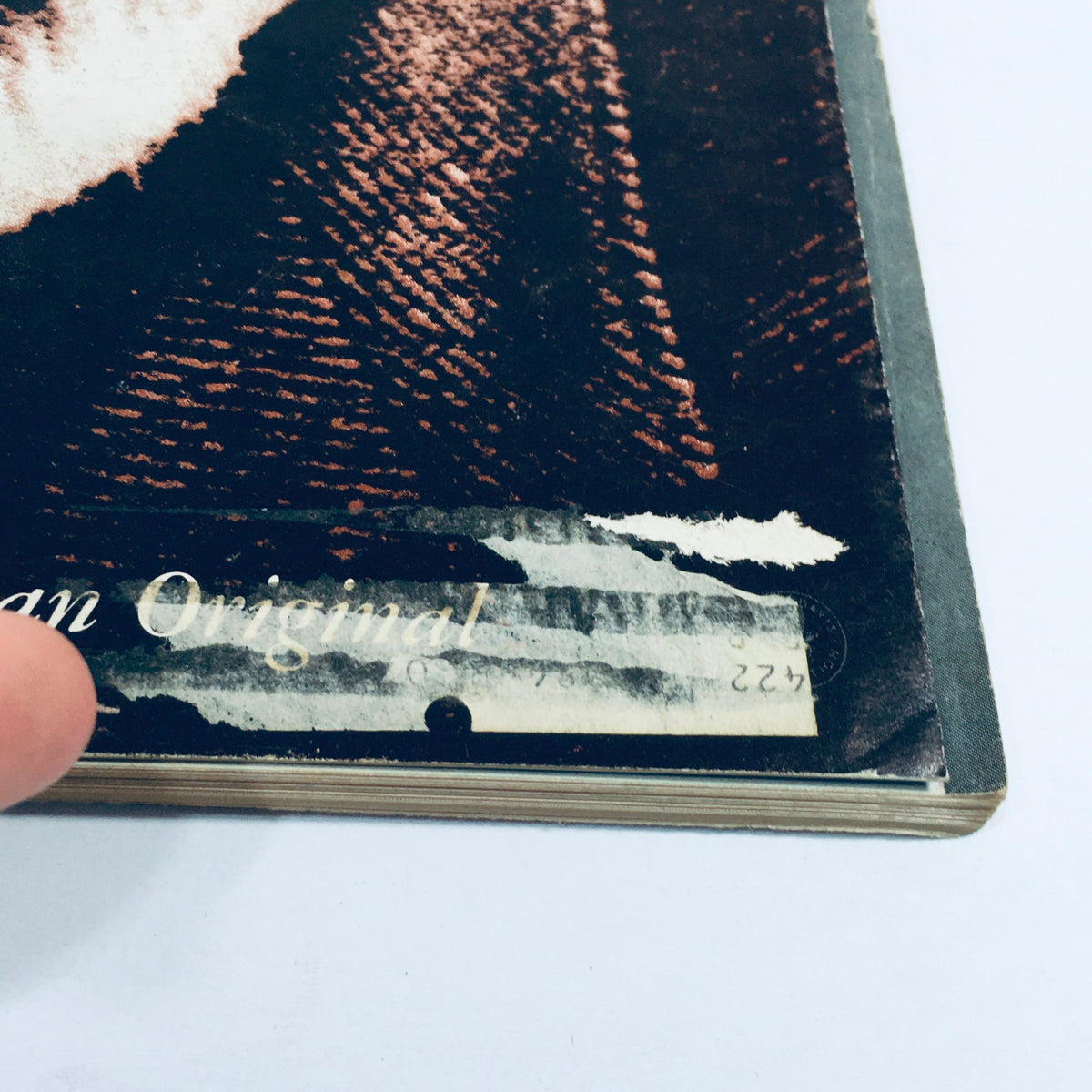 Close-up of the bottom corner of the VTG HiFi Stereo Review Magazine from September 1964, highlighting the title 'Charles Ives: An American Original' and a minor blemish on the cover.