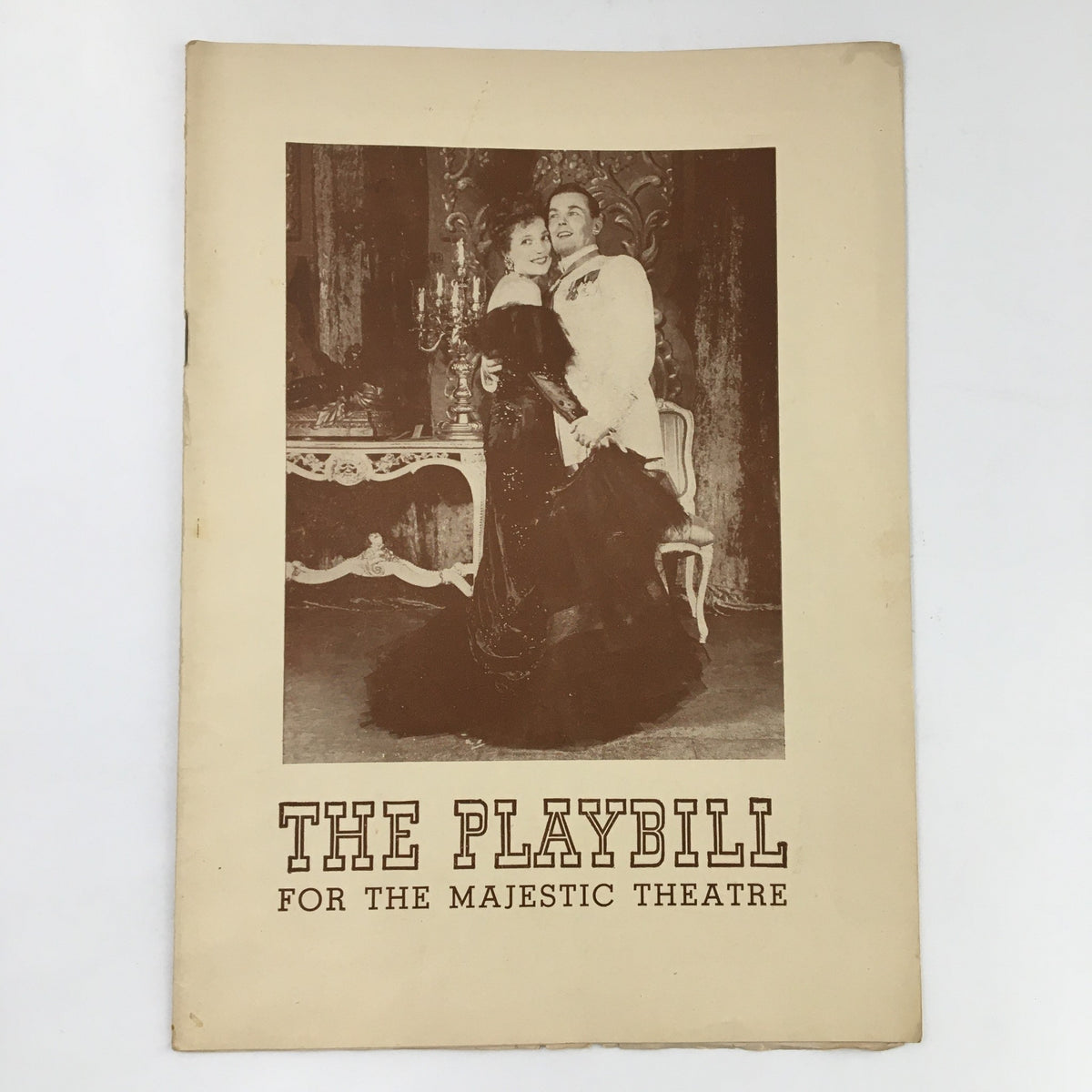 1943 Playbill for The Merry Widow at the Majestic Theatre, featuring a vintage photograph of performers in elegant costumes.