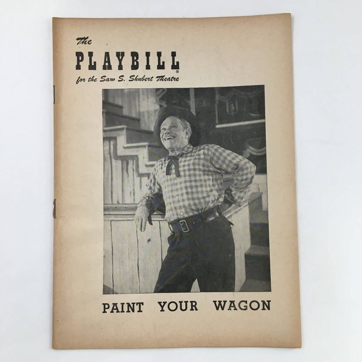 Front cover of the 1952 Playbill for the Sam S. Shubert Theatre featuring James Barton in Paint Your Wagon, showcasing a vintage photograph of a smiling performer.