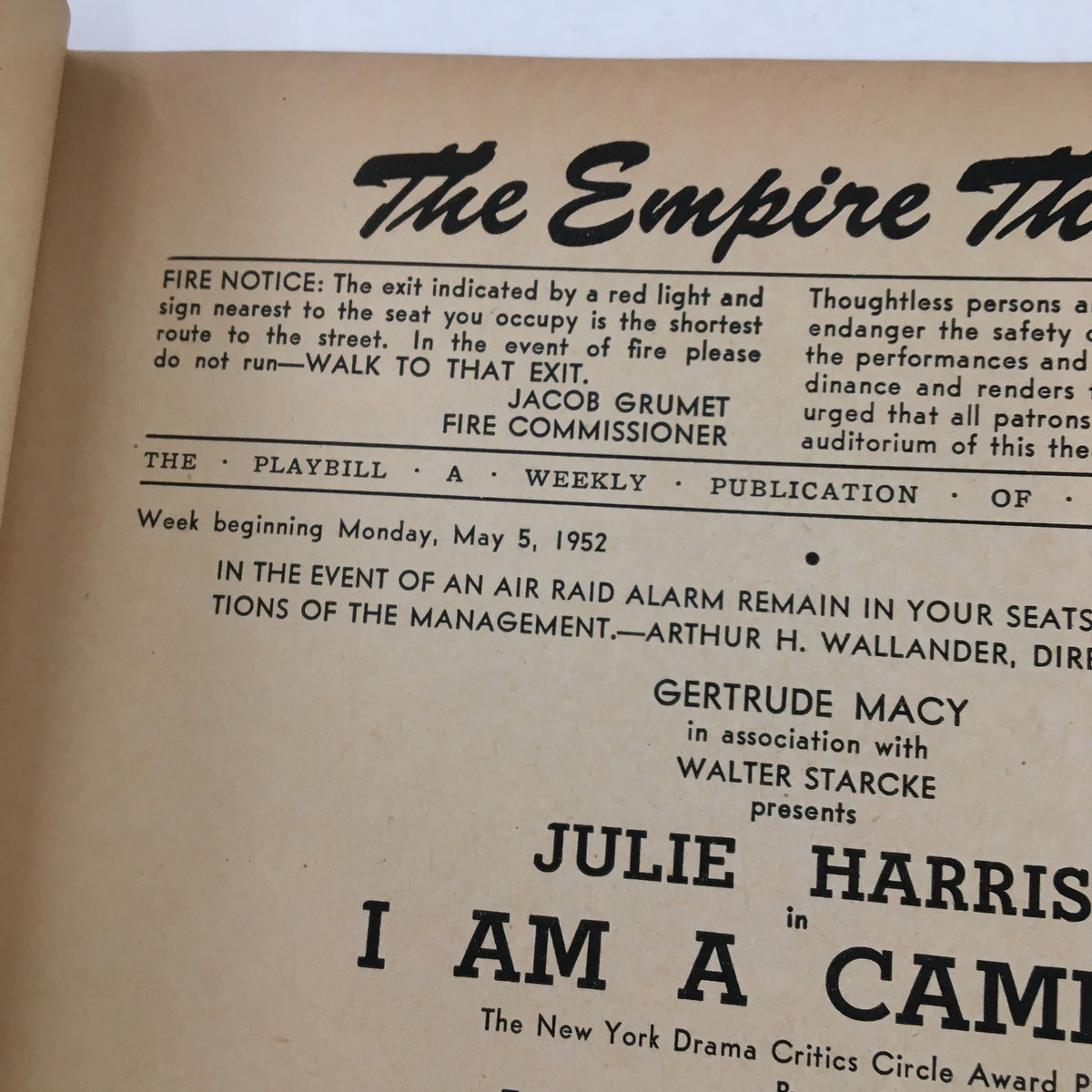 Another view of the inside page of the 1952 Playbill for The Empire Theatre Presents Julie Harris in I Am A Camera, with additional performance information and fire safety notice.