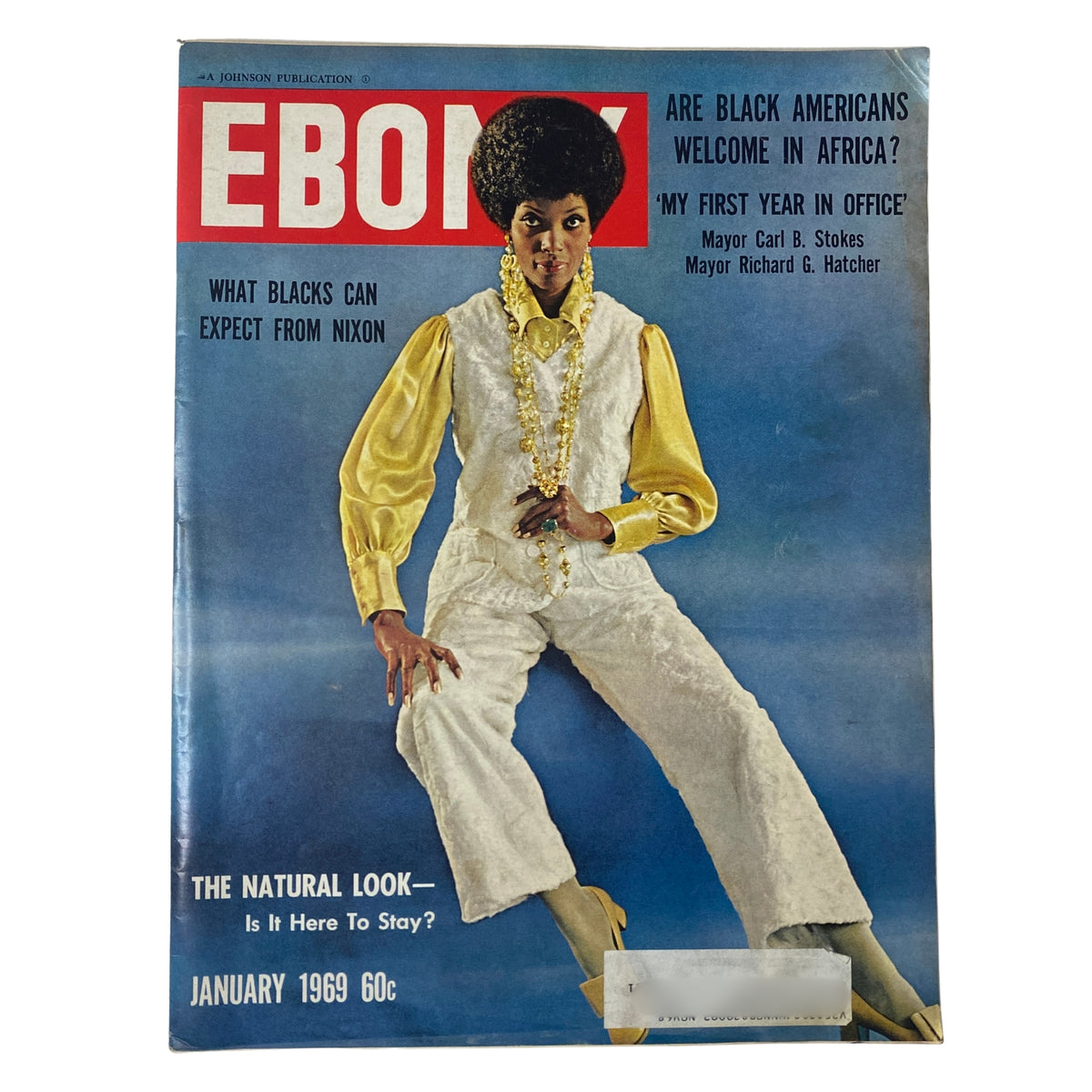 Ebony Magazine January 1969 featuring Georgianna White on the cover, showcasing the natural look in fashion. Highlights include articles on Black identity and politics, as well as cultural reflections. Very Good condition with vibrant colors.