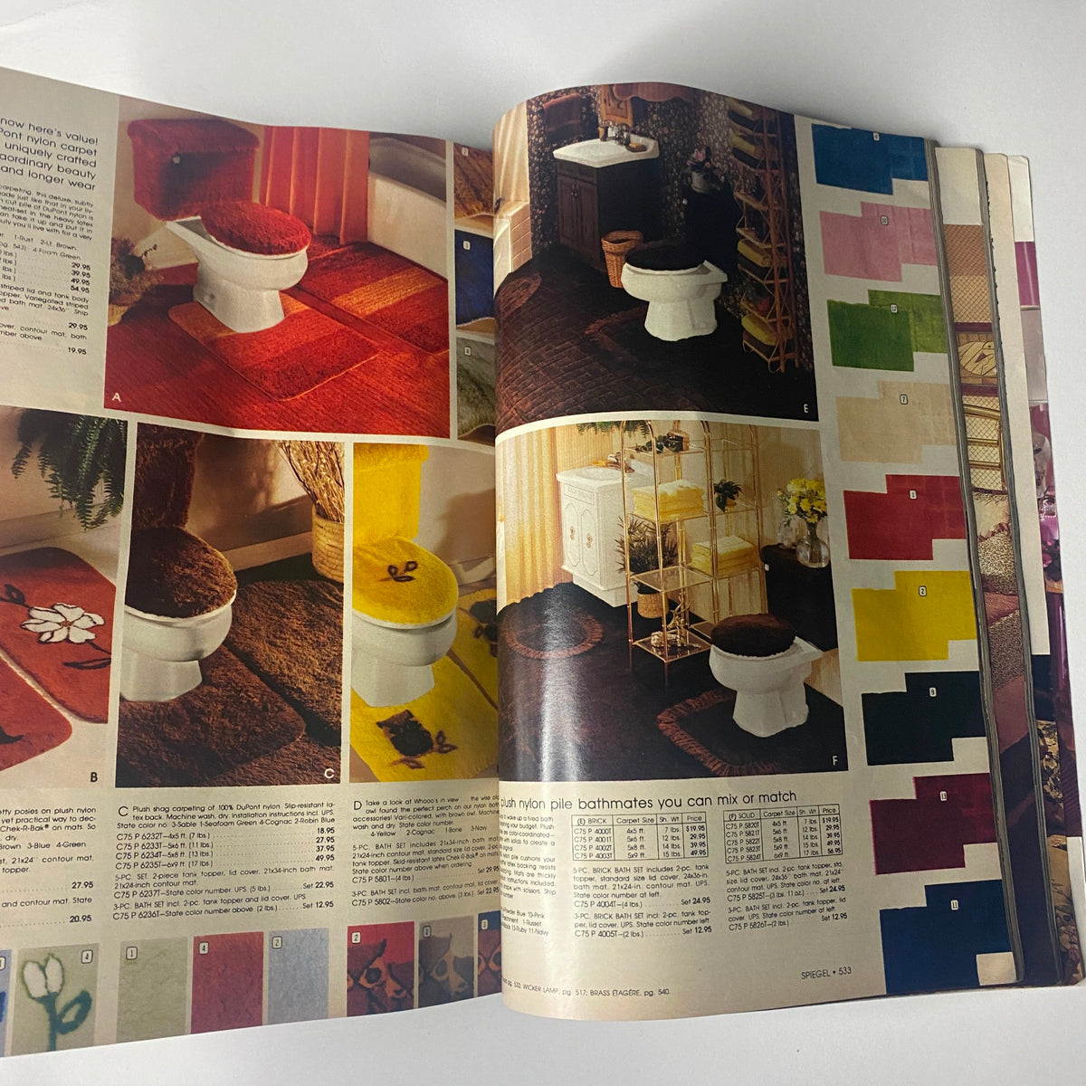 1980 Spiegel Fall and Winter Catalog showcasing stylish bathroom decor with colorful bathmats and coordinating accessories, perfect for home design inspiration.