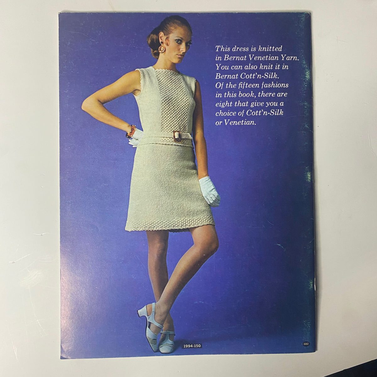 1968 No. 150 Bernat Catalog cover showcasing a model in a sleeveless, knit dress made from Bernat Venetian Yarn, highlighting fashion options available in the catalog.