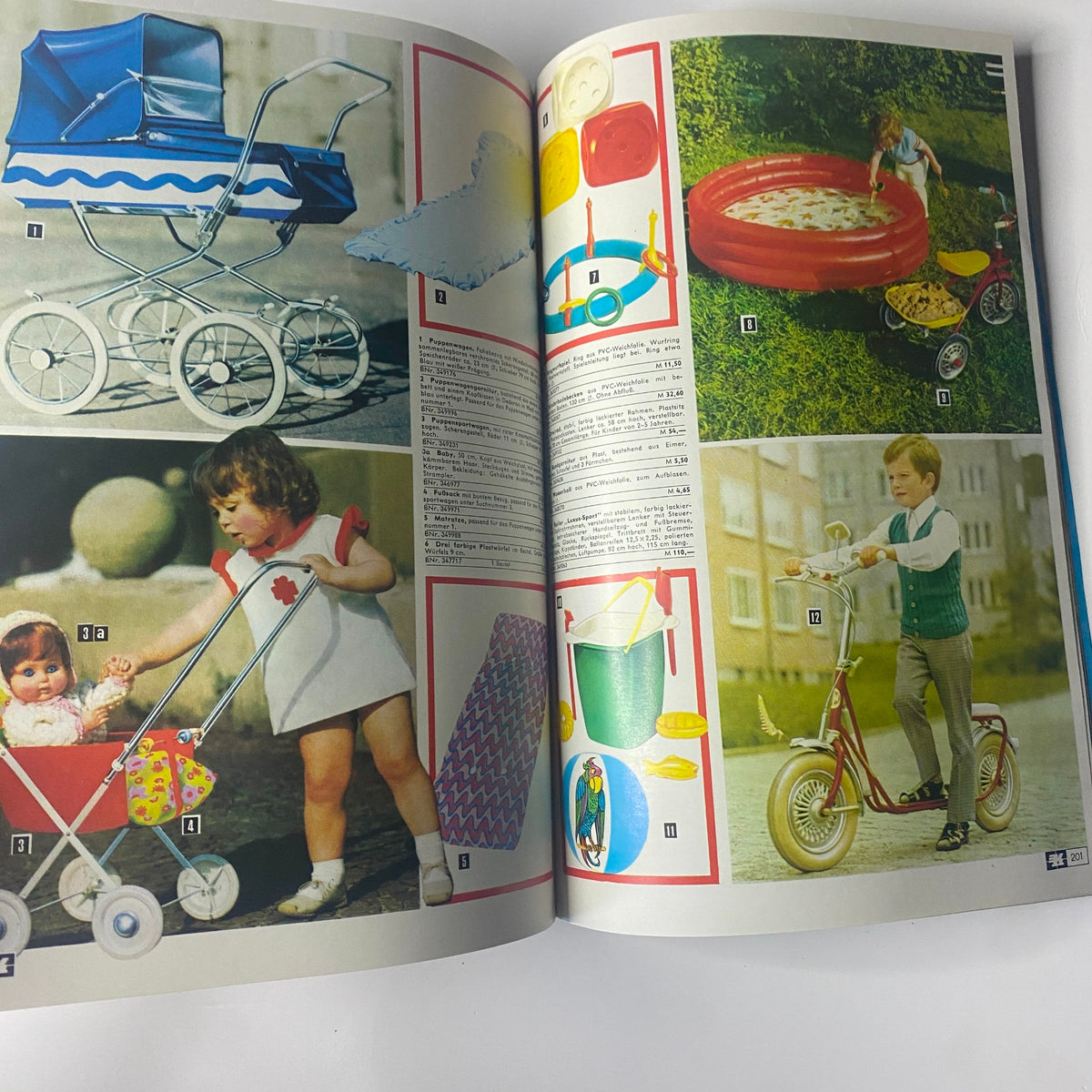 1974 Konsument Summer Catalog featuring children's toys and outdoor play items, including prams, a doll, and a tricycle, highlighting mid-70s child fashion and play culture.