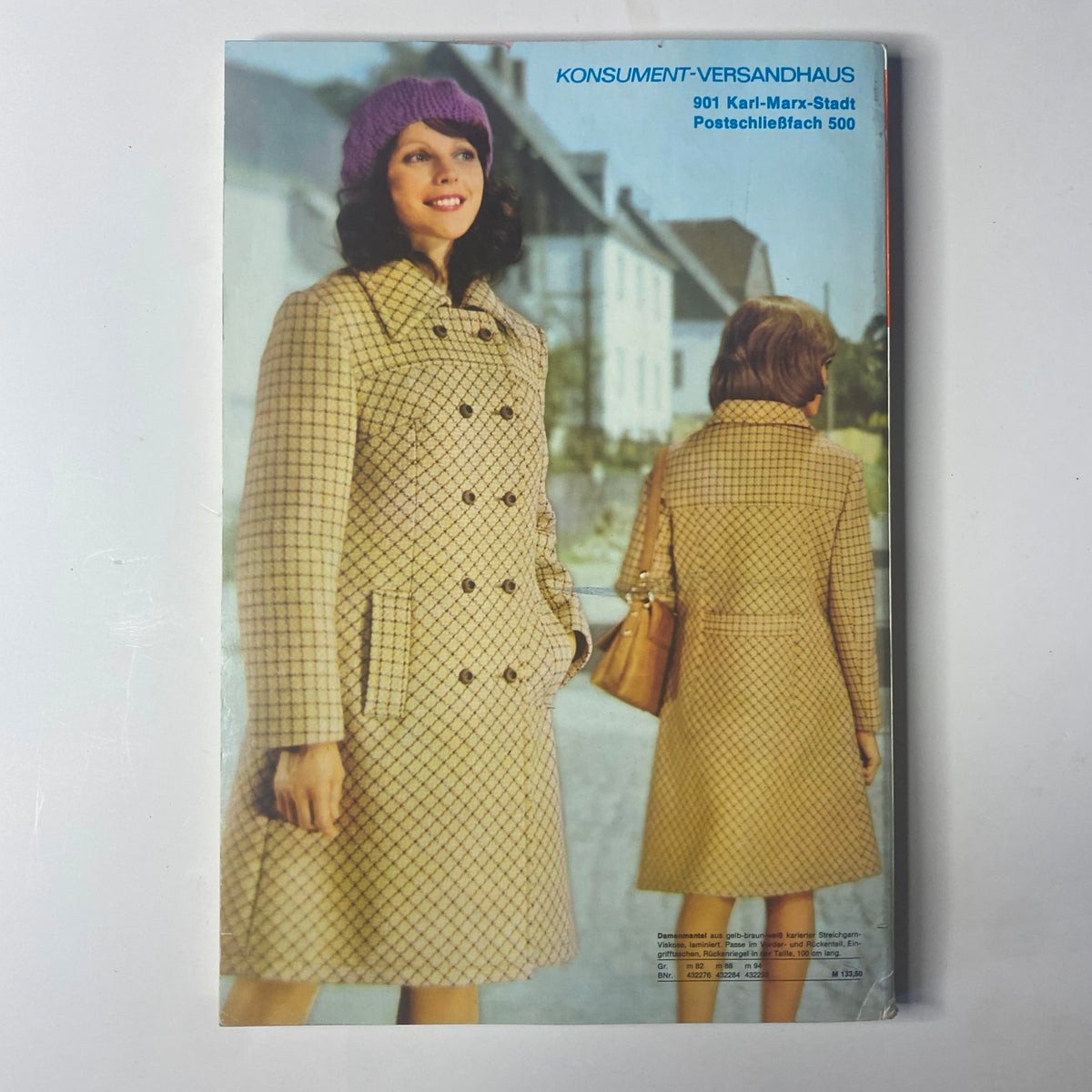 1974 Konsument Summer Catalog cover featuring a woman in a stylish patterned coat, showcasing mid-70s fashion trends and women's outerwear.
