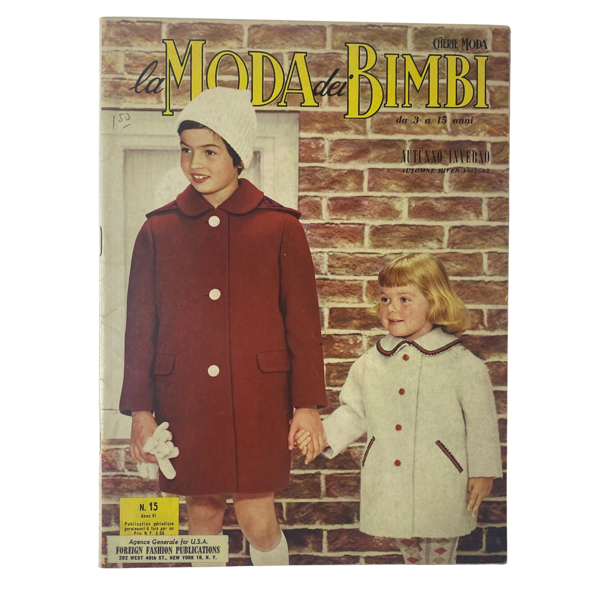 1962 La Moda Dei Bimbi Autumn and Winter Catalog cover featuring two children in stylish winter coats, showcasing mid-century children's fashion.