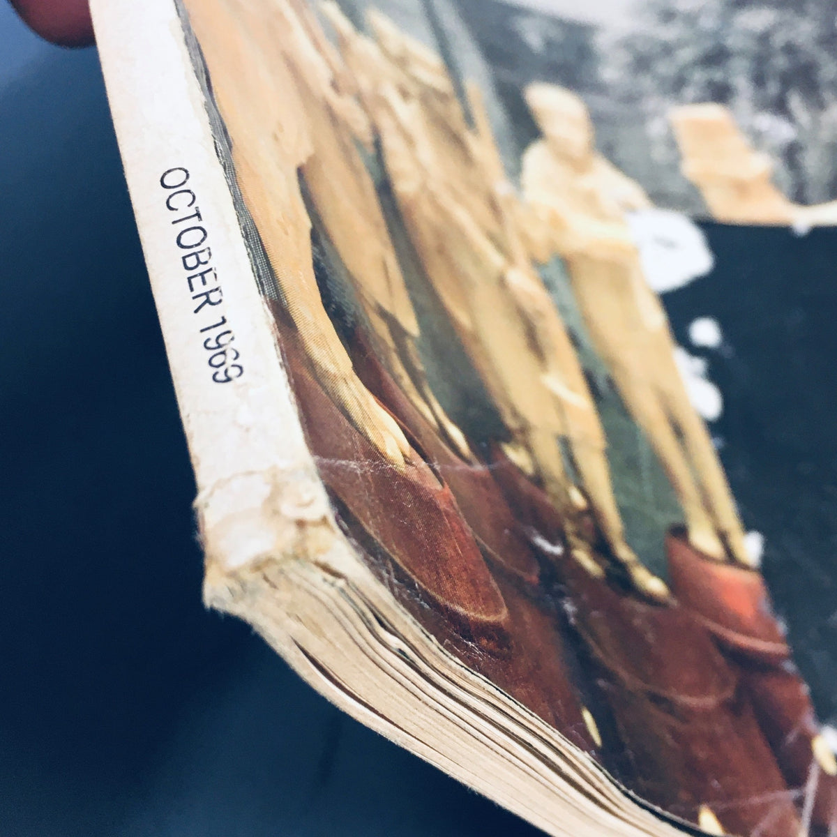 Side view of the VTG Stereo Review Magazine October 1969 highlighting its publication month and year, with evident vintage wear.
