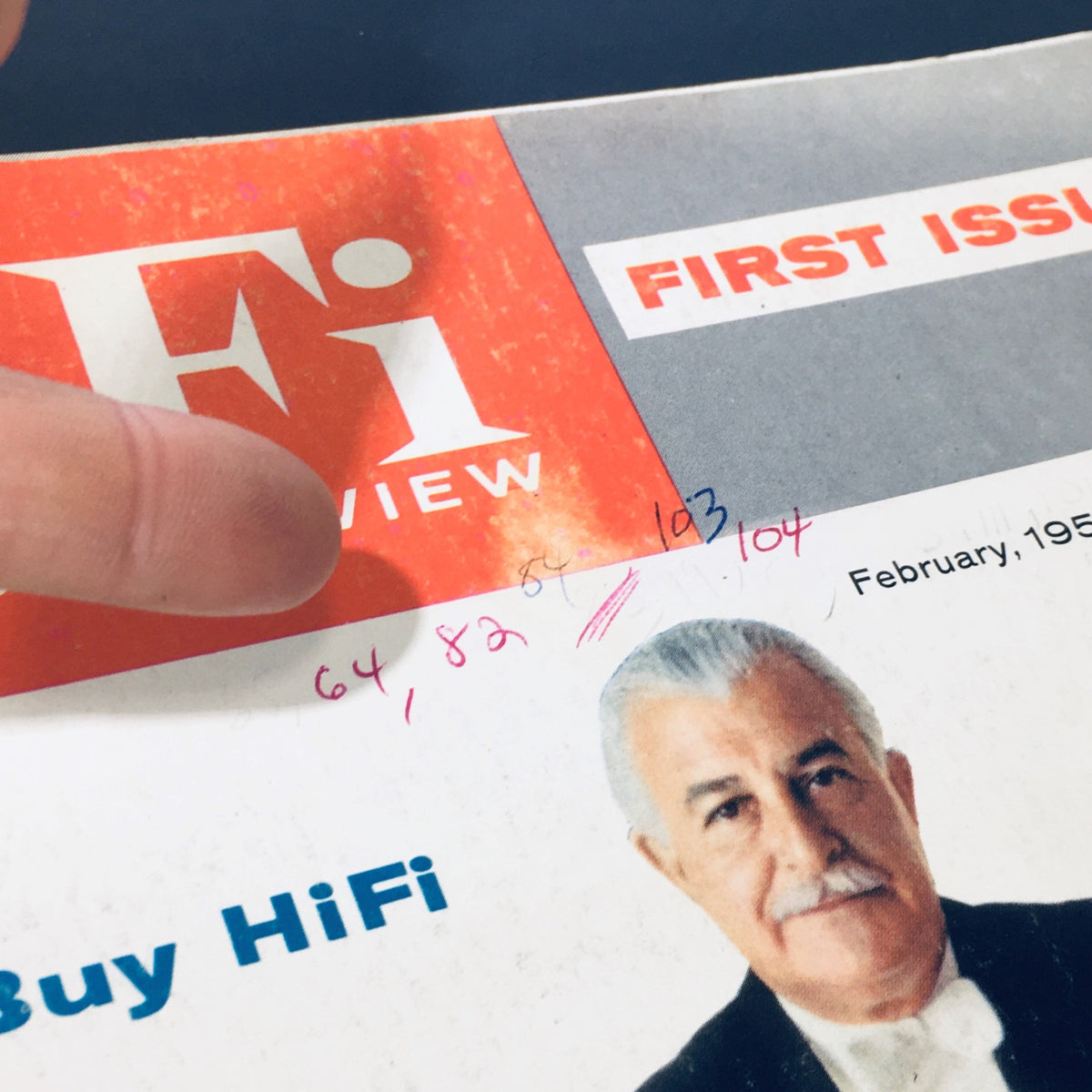 Close-up of the cover of HiFi & Music Review Magazine February 1958, highlighting the title and details including 'How To Buy HiFi' and the issue's features.