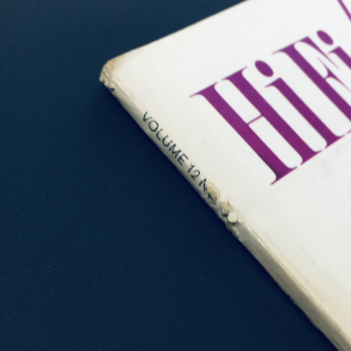 Close-up of the spine of the HiFi Stereo Review Magazine from April 1964, showing the title and volume number, related to a special issue on Baroque Music.