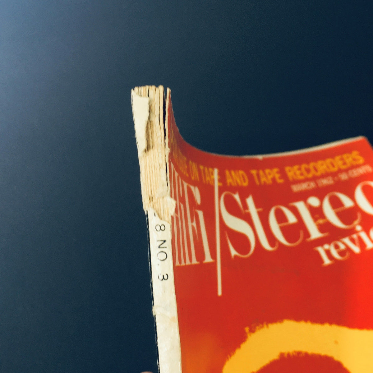 Spine view of VTG HiFi Stereo Review Magazine March 1962 showing minor wear, indicating its vintage condition while emphasizing the magazine's focus on tape recorders.
