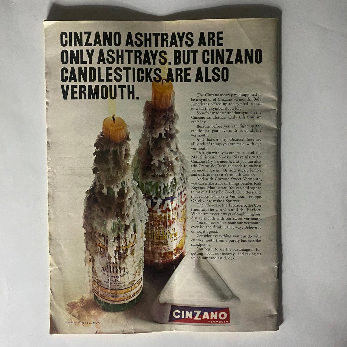 Vintage advertisement page in VTG The Reporter Magazine February 22, 1968, featuring a product advertisement for Cinzano with a creative display of ashtrays and candles.