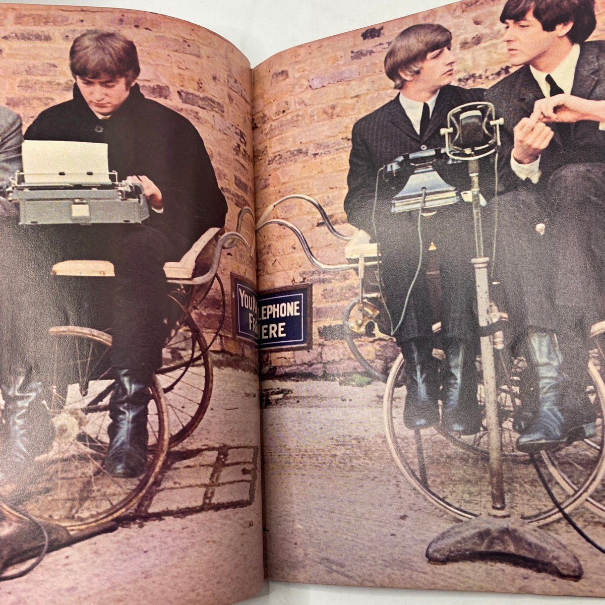 Another inside page from the Vintage 1964 Beatles Movie Book depicting the Beatles on bicycles during the filming of 'A Hard Day's Night', capturing a whimsical moment.