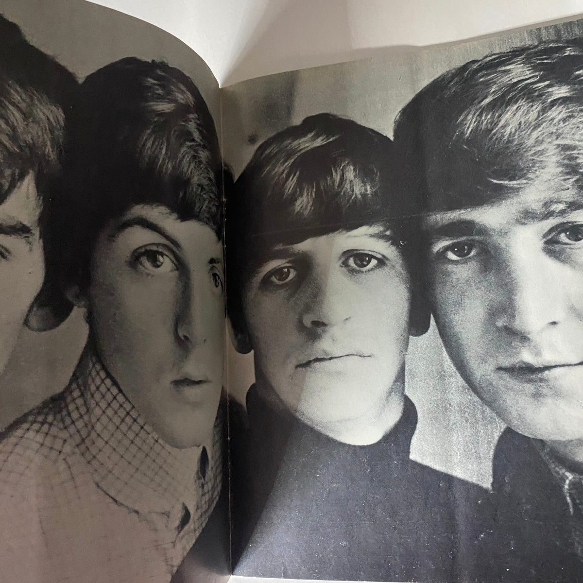 Vintage 1964 The Beatles by Norman Parkinson featuring a close-up portrait of Paul McCartney, John Lennon, and George Harrison, ideal for fans and collectors.