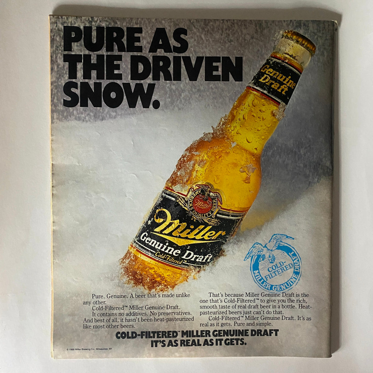Vintage advertisement for Miller Genuine Draft beer from February 1989 Spin Magazine, featuring the slogan 'Pure as the driven snow' and showcasing a frosty bottle of beer with cold-filtered branding.